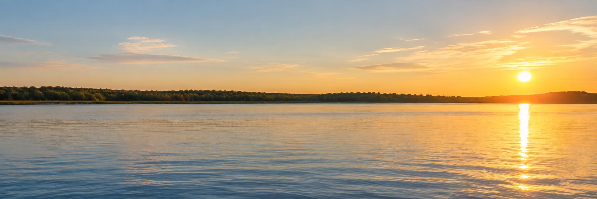 Golden evening light over a peaceful river